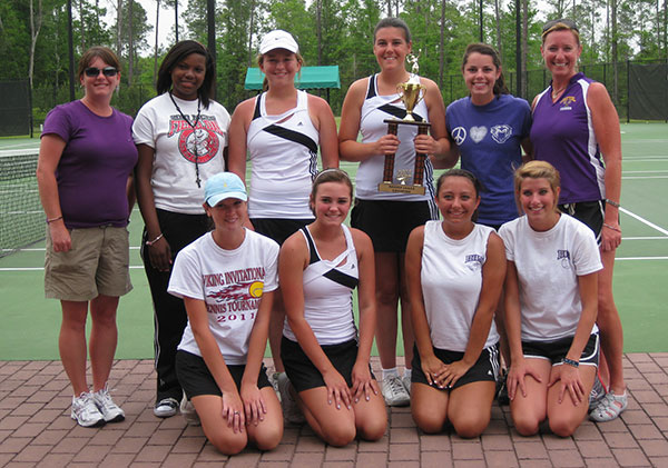 Girls_Tennis_Region_Champs GIRLS TENNIS REGION CHAMPIONS from Bainbridge High School, with the trophy they won Thursday, are front row, left to right, Lynsey Waddell, Emma Kate Smith, Kelly Brooks, Meredith Conder; back row, Coach Amy Thomas, Destiny Salter, Anne Reynolds, Malori Maxwell, Kristen Monson and Tournament Director Tabitha Spooner.