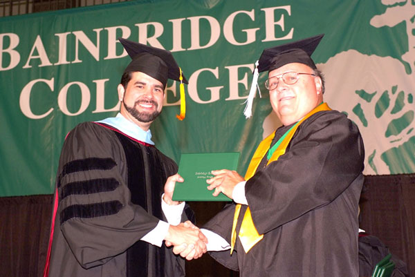 1_Outstanding-graduate-James-Ulmer-receives-diploma---rgb-180-dpi
