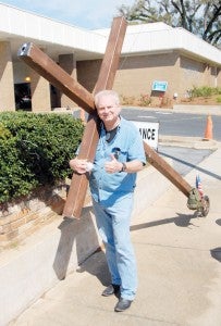 Rick Newton, who has been carrying a Christian cross around the world since 1975, passed through Bainbridge last Thursday afternoon, on his way to Dothan,  Ala., and eventually to Central America.|Brennan Leathers
