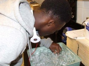 CEDRIC JONES places the vial containing his DNA on ice. 