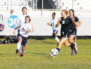 Members of the Bainbridge Lady Cats pursue the ball in a recent game against Providence Christian. Bainbridge topped Americus-Sumter on Tuesday, 5-0.|Brennan Leathers