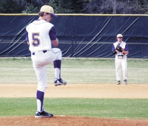 Anderson Bailey prepares to pitch for the Bainbridge High School junior-varsity team, while Dustin Strickland sets up on defense at second base, during the Bearcats’ 3-2 loss to Thomas County Central on Tuesday. | Submitted photo