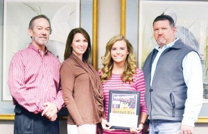 Decatur County FFA member Hannah Bius, second from right, won the Grand Champion Breeding Heifer Award with her Shorthorn crossbred heifer at the 2013 Georgia Junior National Livestock Show in Perry, Ga., Feb. 22. She fed the heifer exclusively Flint River Mills (FRM) Heifer Developer feed, made at the company’s Bainbridge plant. Shown are, left to right, John Powell of FRM, Laura Smith of FRM, Hannah Bius and Martin Bius.