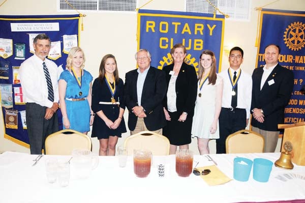 ESSAY CONTEST WINNERS: The Bainbridge High School grade winners of the Rotary Club’s “Laws of Life” essay contest were honored at Tuesday’s club meeting. Shown are, left to right, club member Charlie Bowles, senior and school winner Searcy Smith, junior winner Jeannie Richards, club member John Monk, club member Emily Yent, sophomore winner Emily New, freshman winner Quang Pham and club president Bo Jones.