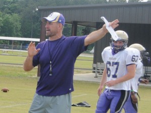 New Bainbridge football coach Jeff Littleton directs his players to their next drill during Monday’s practice.|Justin Schuver