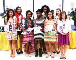 LADY CATS AWARDS: Shown are, left to right, Amadelia Barrios, Isis Crawford, Treesy Hurst, Derrical Williams, Longeisha Emanuel, Jennifer Becerra, Caitlin Cato and Paige Braswell.