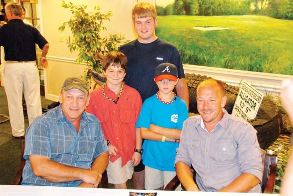 “SWAMP PEOPLE” STARS VISIT: Troy and Jacob Landry, stars of The History Channel’s ‘Swamp People,’ attended a fish fry held at the Bainbridge Country Club on Friday. From left to right are Troy Landry, Miles Cundiff, Logan Davis, Jackson Davis and Jacob Landry.