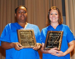 Photo of Award Winners: Being recognized for their achievement in Bainbridge State College’s Medical Assisting program are, from the left, Ronnisha Bush, who was presented the Outstanding Academic Student Award, and Amelia Jensen, who was presented the Outstanding Clinical Student Award. Both students are from Bainbridge.