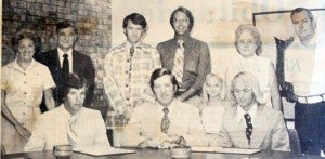The first graduation ceremony at Bainbridge Junior College was held in June 1974. Seated are the first graduates Melvin “Tuffy” Nussbaum III of Bainbridge, on the left, and Terry F. Prince of Cairo, on the right. In the middle is Bainbridge Junior College President Edward Mobley. Standing, from the left, are Mrs. and Mr. Melvin Nussbaum; David Hay, director of student development services; Dr. Robert Dubay, academic dean; Linda Prince, Terry’s sister; and Mrs. and Mr. Marion Prince.