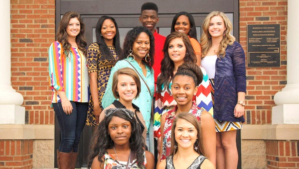  In front are freshman attendants Shamaura  Chukes and Ellie Jeter, on the second row are sophomore attendants Taylor Bush and Rickia Hughes. On the third row are junior attendants Alexandria Carter and Chelsea Lynn and on the fourth row are senior attendants Morgan Phillips and Taylor Austin, homecoming king Re’Quan Parris and senior attendants Teena Jeffery and Zhyannah Bius. 