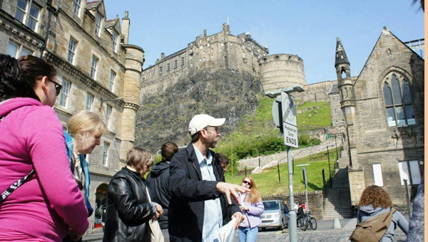 BSC professor Dr. David Nelson, in the center with the white cap, is teaching BSC students while in Edinburgh on a study abroad trip. These trips offer unique cultural experiences for students.