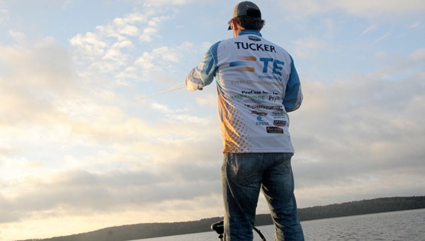 Angler JTodd Tucker fishes the waters of Lake Seminole early Wednesday morning in the Bass Elite Series practice rounds. Tucker who grew up on the lake and is sponsored by the City of Bainbridge said he is hoping for a win in a tournament so close to home. -- Powell Cobb
