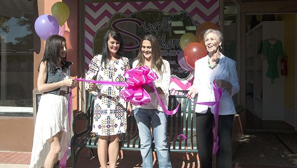 Misty Davis, Crissy Young, Teresa Chason and Suzy Willis cut the ribbon on Simply Southern, a clothing boutique on the square.