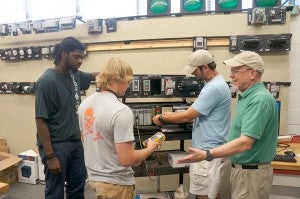 Assistant Professor of Electronics, Claude Bell, demonstrates to students the proper techniques associated with electronics technology at the Early County site’s state-of-the-art instructional facility. 
