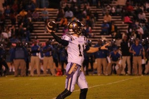 Junior quarterback Brett McLaughlin pulls back for a pass against the Americus-Sumter Panthers Friday night.
