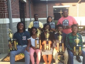 Track awards: Top Bainbridge High School Bearcats and Lady Cats track performers display their honors. From left front are Zion McGee, Tyaisha Gant, Uriyah Davis, Poncherella Leonard and Jaylyn Scott. From left back are Elijah  Tyler, Amari Smith and Charles Hightower. Honorees not pictured are Jarvis Freeman, Danbrell Harris, William Johnson, Curtis Keaton, Lorenzo Mitchell, Emilee Poppel, Makayla Cooper and Iran Brown.