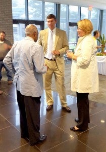  Dr. Stuart Rayfield and her husband David talk to Luther Conyers during a meet and greet session at the Kirbo Center. 
